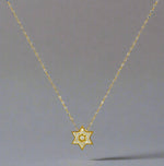 Load image into Gallery viewer, Sparkling Gold Star of David Necklace with Cut out Star
